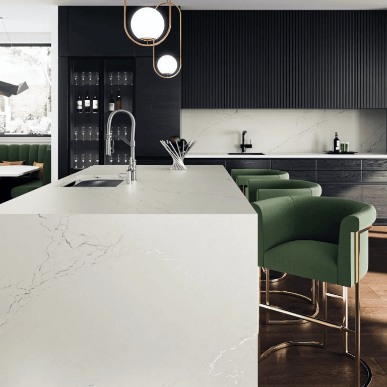 a modern kitchen with a white sold surface countertop and modern green barstool