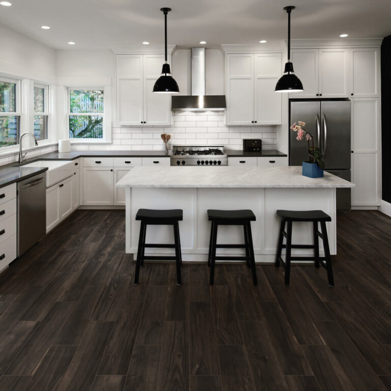 very dark laminate flooring in a white transitional kitchen