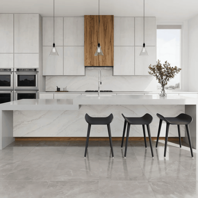a modern kitchen with white cabinets and black stools and grey tile flooring