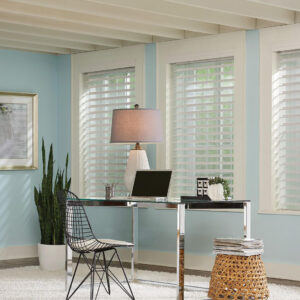 white plantation shutters in a home office