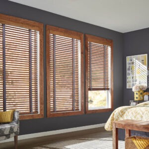 Luxury wood blinds in a grey bedroom