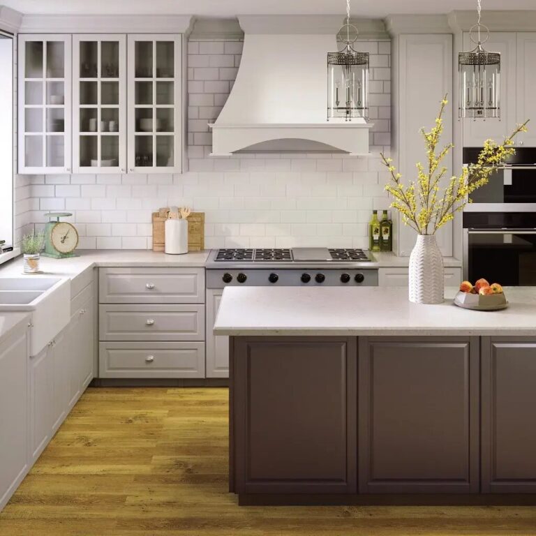 solid surface counters in a kitchen with two-toned cabinetry