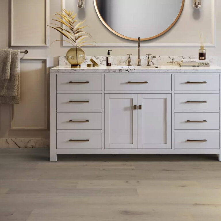 transitional bathroom cabinet with warm toned laminate flooring