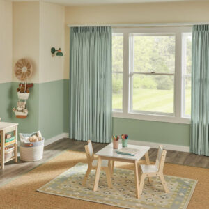 Seafoam green drapery in a childrens playroom