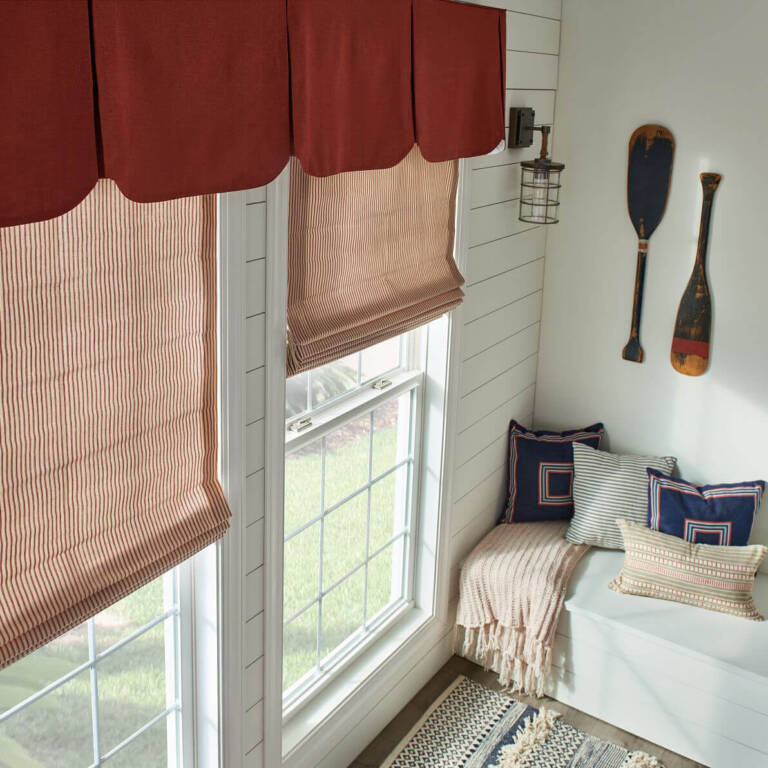 Graber roman shades in a casual bedroom